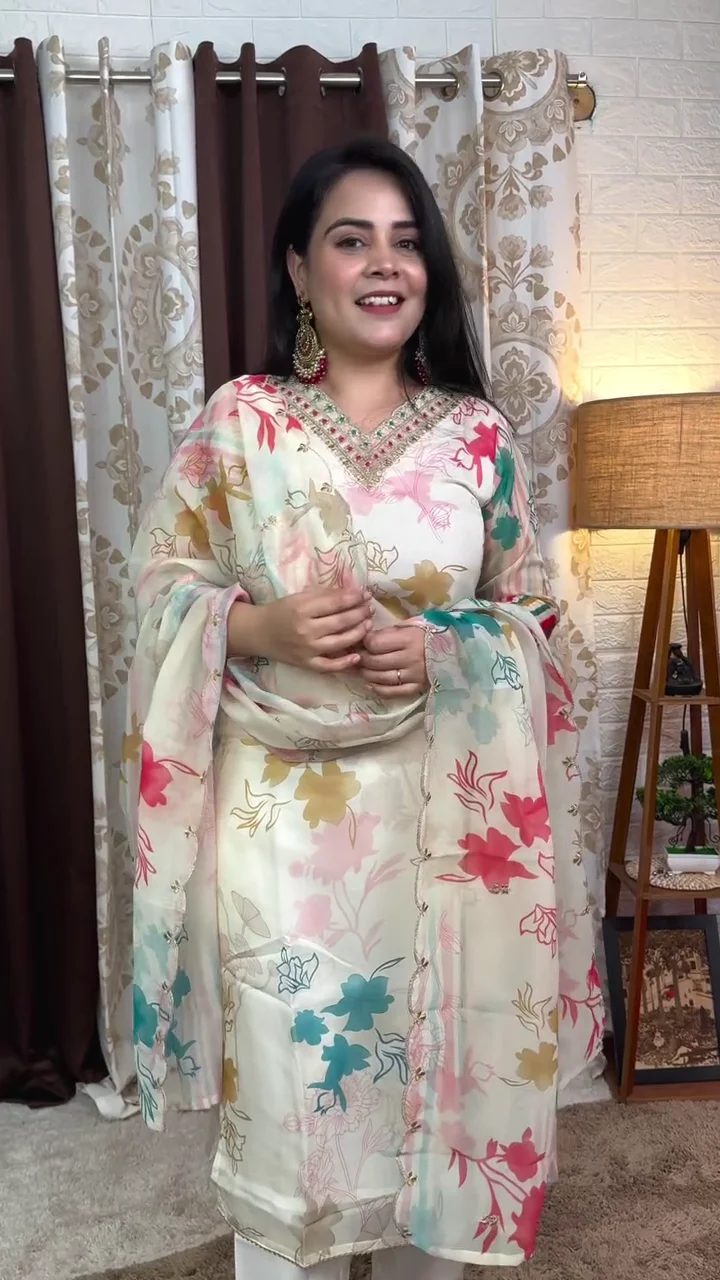 floral printed anarkali kurta with elegant embellished neckline, paired with coordinated churidar and light sheer dupatta floral printed anarkali kurta with elegant embellished neckline, paired with coordinated churidar and light sheer dupatta